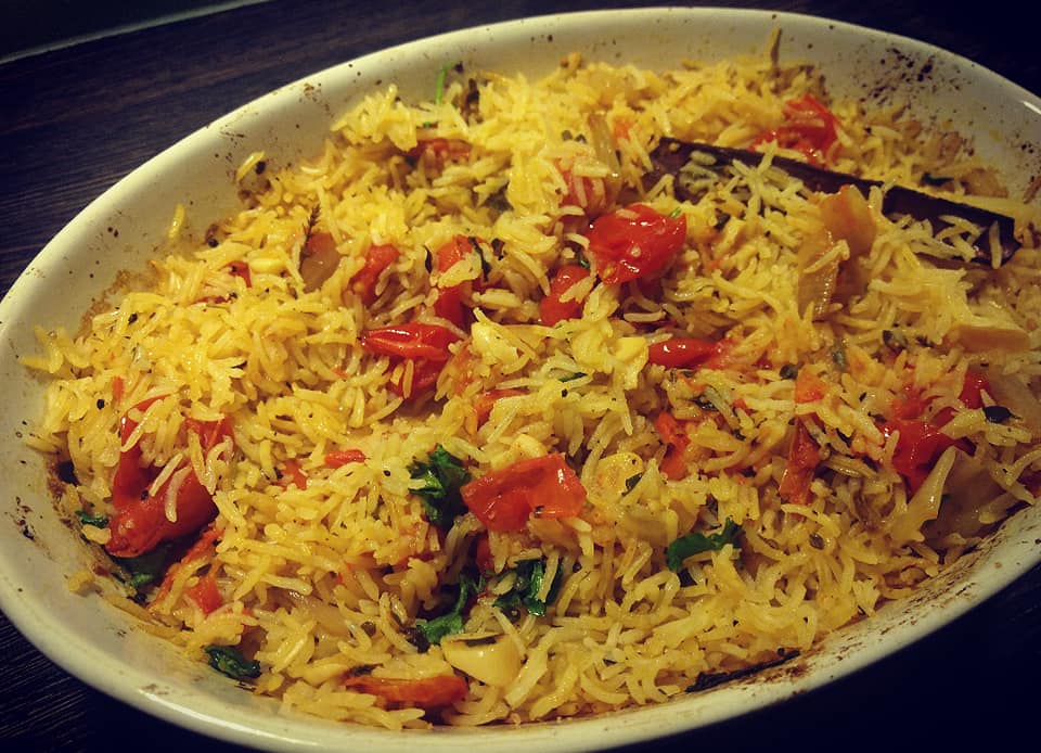 Baked Rice with confit Tomatoes and Garlic